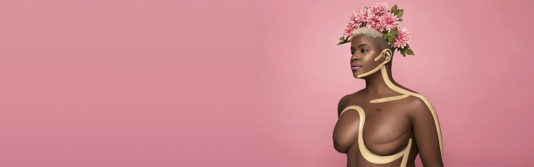 Ericka Hart with beautiful floral headdress and artistic body paint