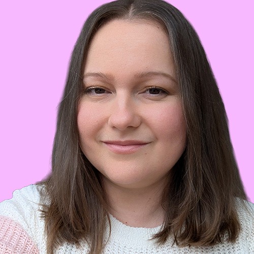 Risa Kerslake, a registered nurse, looking into the camera