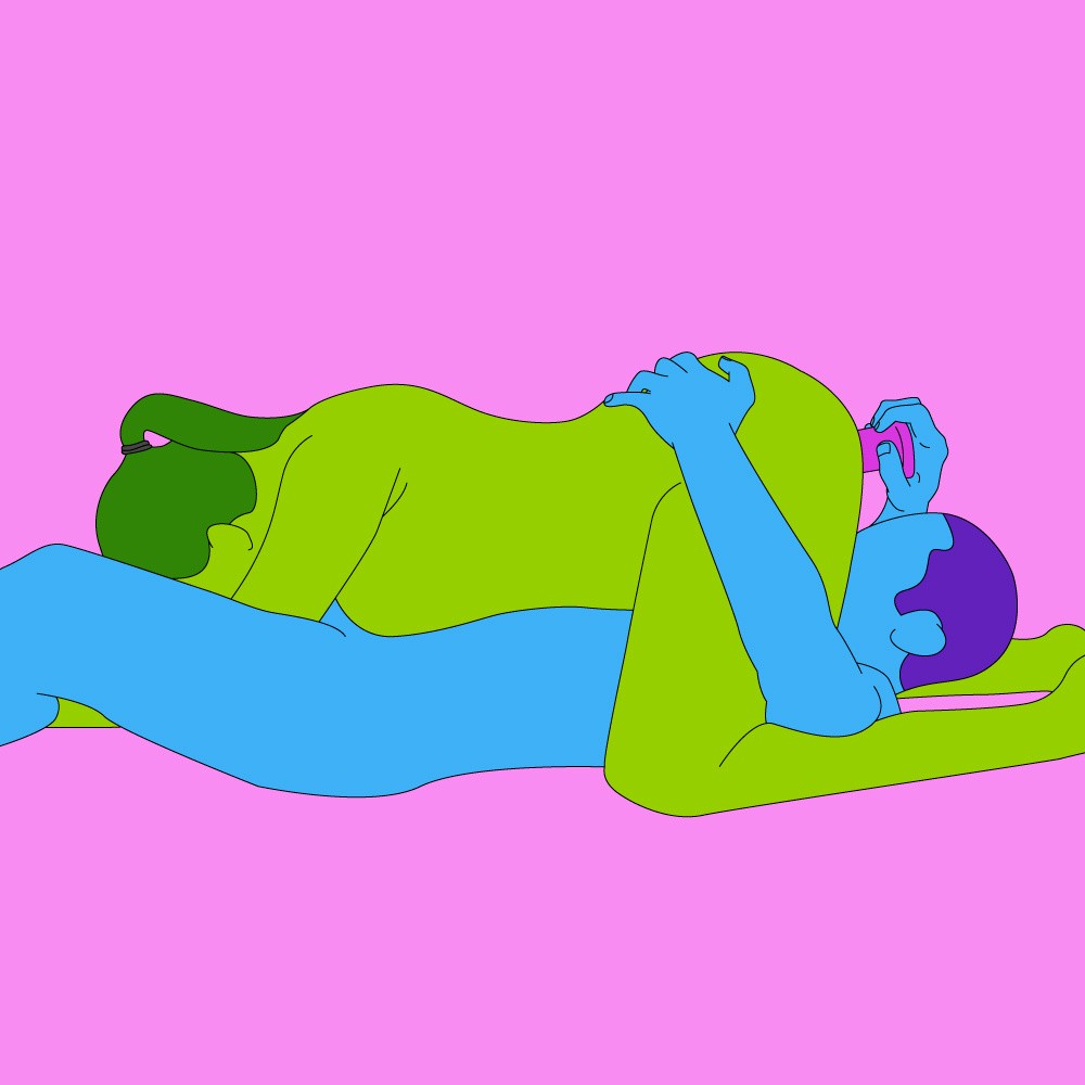A naked illustrated couple in a 69 sex position with a dildo.