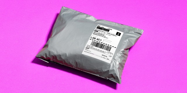Simple envelope on fuschia background