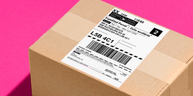 Small plain brown box on pink background