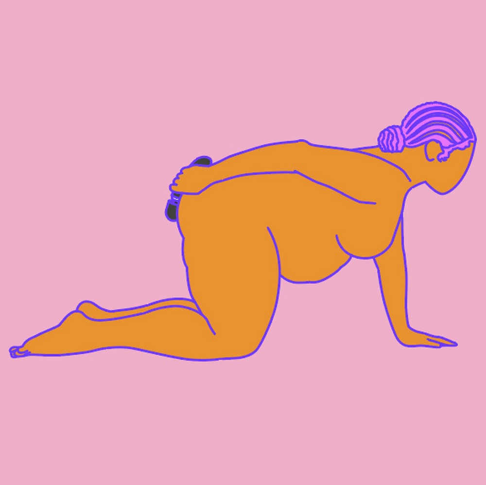 A naked illustrated woman kneeling on fours and holding a wand massager against her rear.