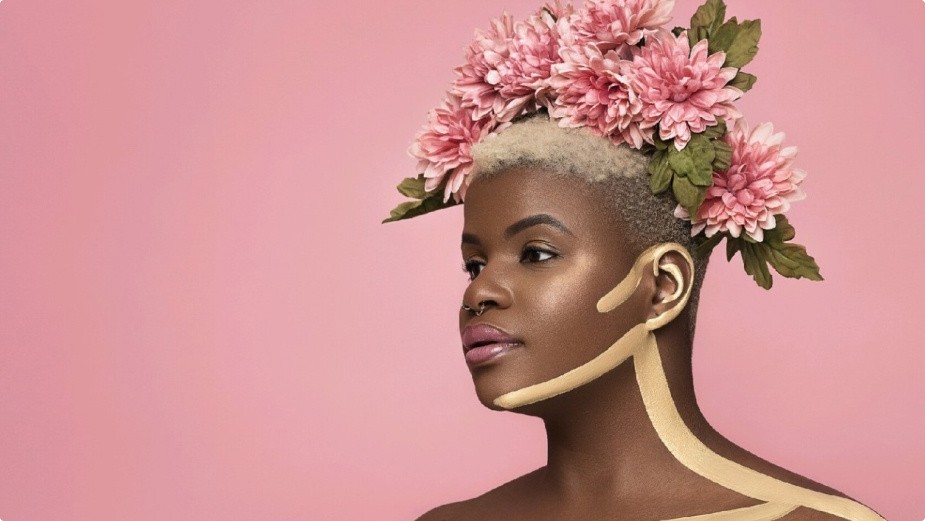 Ericka Hart with beautiful floral headdress and artistic body paint