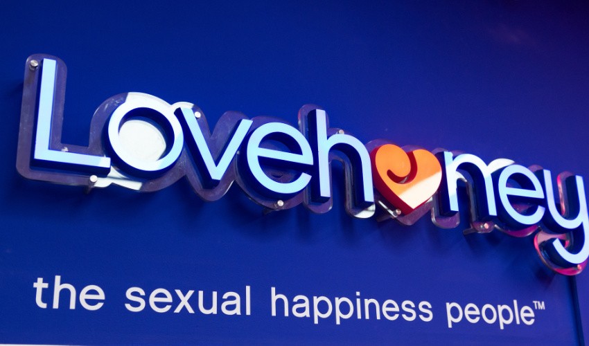 Storefront signage that reads "Lovehoney - the sexual happiness people"